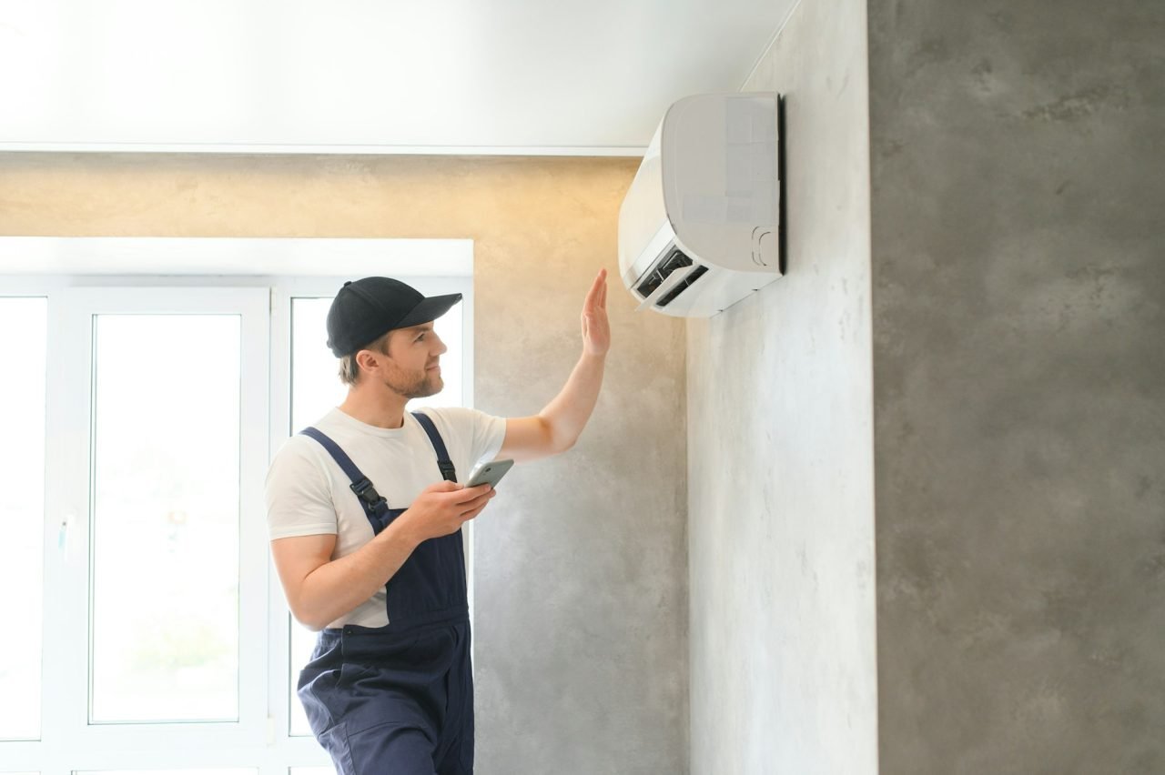 service-man-is-cleaning-repair-and-maintenance-of-air-conditioner-1-2.jpg